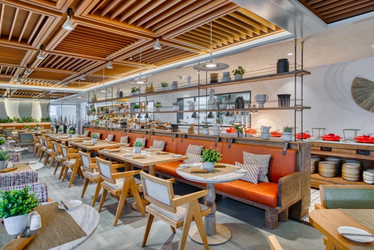 The First Collection Dubai Business Bay Hotel ภายนอก รูปภาพ Interior of the restaurant