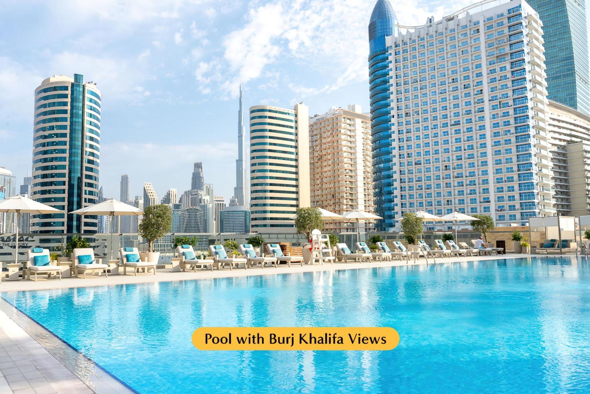 The First Collection Dubai Business Bay Hotel ภายนอก รูปภาพ Pool with Burj Khalifa views